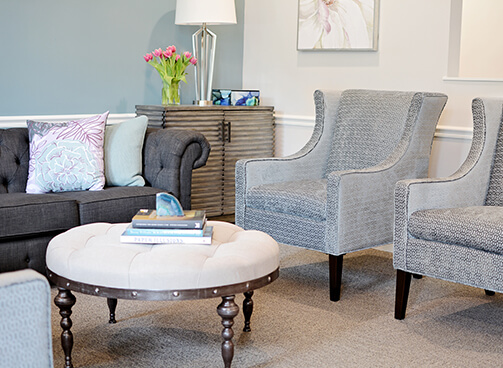 Plush couch and chairs in our modern waiting room